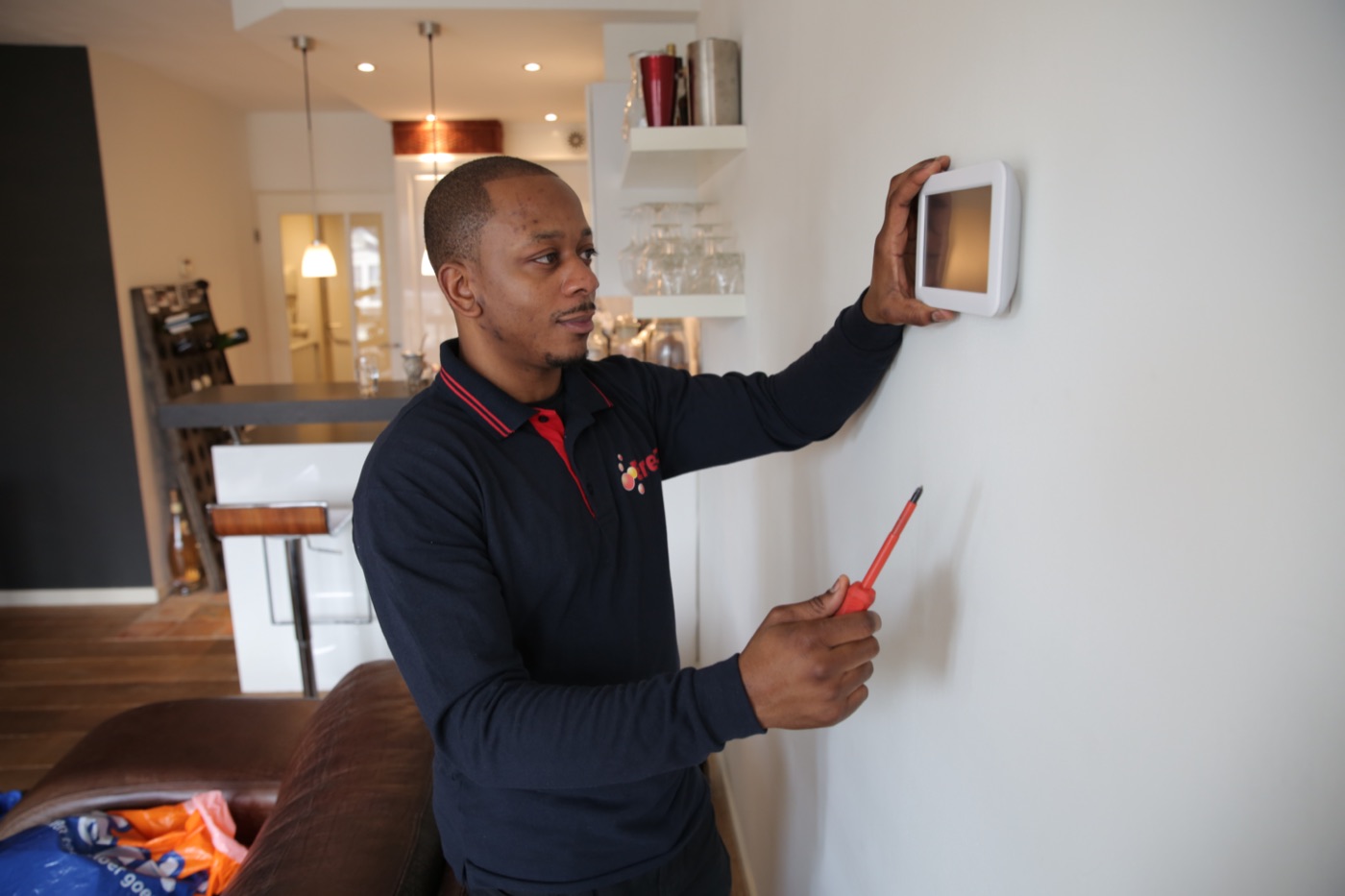 Technician configuring a smart home device